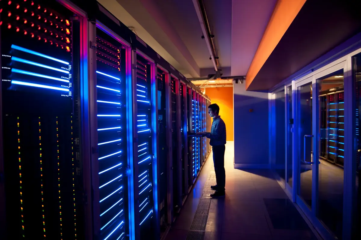 IT engineer configuring servers in a data center